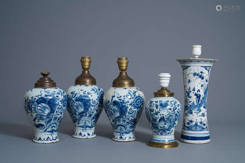 Five Dutch Delft blue and white lamp mounted vases, 18th C.