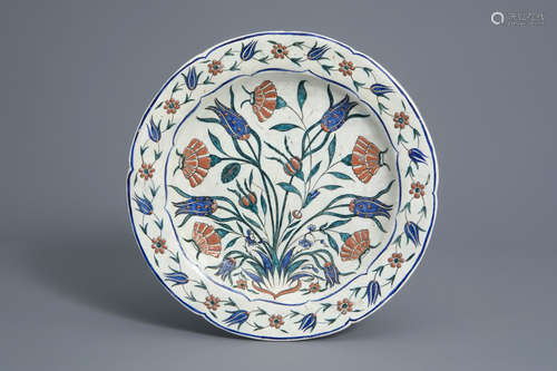 A polychrome Iznik style dish with floral design, Kutahya, Turkey, 19th C.