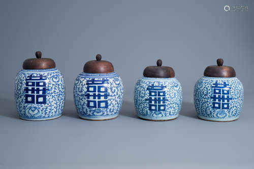 Four Chinese blue and white 'Xi' jars and covers with floral design, 19th/20th C.