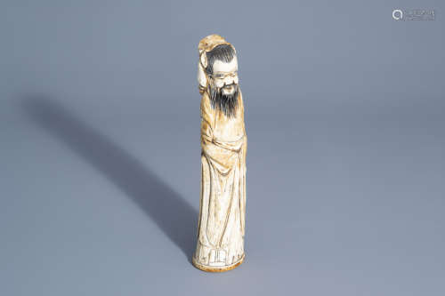 A Chinese carved figure of an Immortal, about 1900