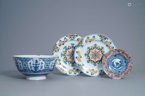 A large blue and white English Delftware bowl with floral design, a pair of polychrome dishes and a