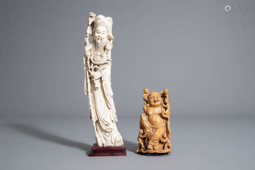 Two Chinese carved figures of an Immortal and a Buddha with children, 19th/20th C.
