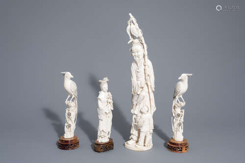 Four Chinese figures of a fisherman, a lady with flowers and a pair of parrots, first half of the 20