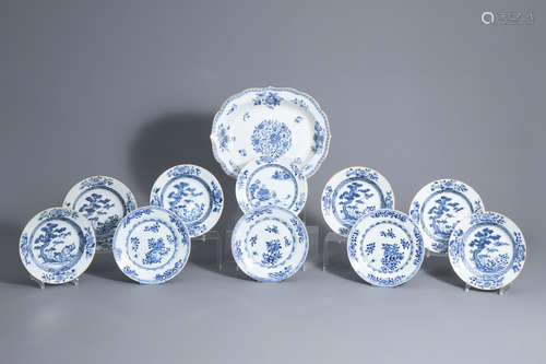 Ten Chinese blue and white plates and a charger with floral design, Qianlong