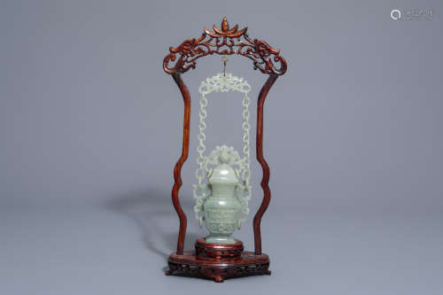 A Chinese jade vase and cover on wooden stand, Republic