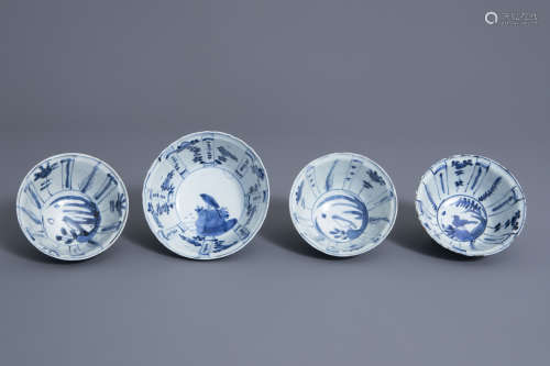 Four Chinese blue and white kraak porcelain 'crow' cups or bowls, Wanli