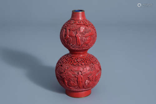 A Chinese carved cinnabar lacquer double gourd vase with Cultural Revolution design, 20th C.