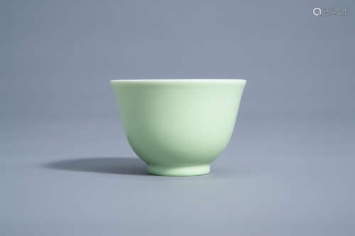 A Chinese monochrome lime-green ground wine cup, Yongzheng mark and possibly of the period