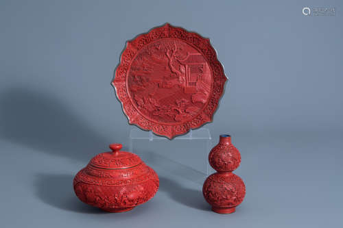 A Chinese carved cinnabar lacquer double gourd vase, a dish and a covered bowl with different design