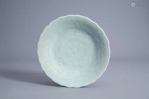 A lotus shaped Chinese monochrome celadon dish with incised floral design, Qianlong