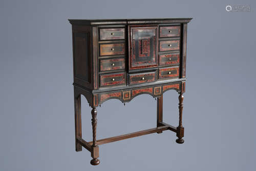 A large tortoise veneer and ebony wood cabinet on stand, Antwerp, 17th C. and later