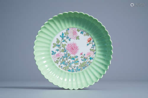 A Chinese famille rose lemon ground lotus dish with floral design, Qianlong mark, 19th/20th C.