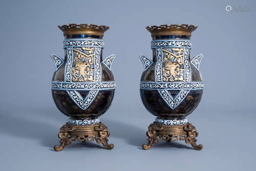 A pair of French HB & Cie Choisy-le-Roi polychrome and gilt decorated bronze mounted vases with a li