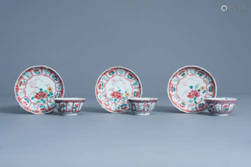 Three Chinese famille rose cups and saucers with floral design, Yongzheng