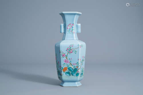 A Chinese hexagonal famille rose blue ground vase with floral design, Qianlong mark, 19th/20th C.