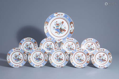 Nine Chinese famille verte plates and a charger with flowery vases, Qianlong