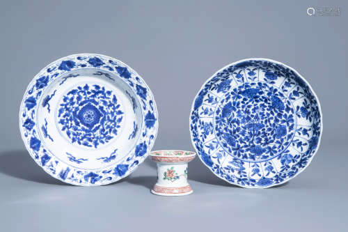 Two Chinese blue and white plates and a famille verte caster with floral design, Kangxi