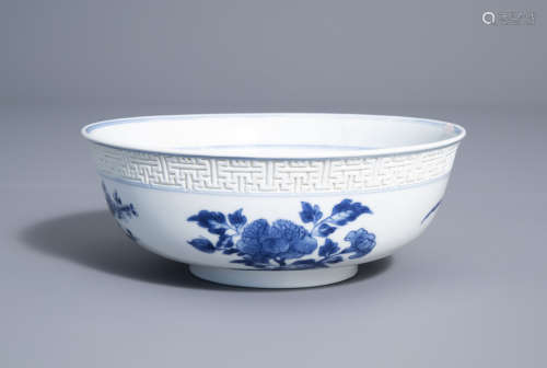 A Chinese blue and white relief moulded 'Immortals' bowl, Kangxi