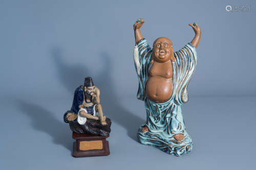 A Chinese Shiwan pottery figure of Buddha and one of a monk on a base, seal mark, 20th C.