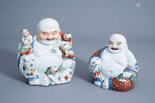 Two Chinese famille rose figures of Buddha, 19th/20th C.