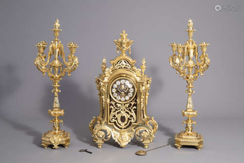 A French three-piece gilt bronze Renaissance and Baroque revival clock garniture, 19th/20th C.