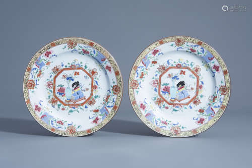 A pair of Chinese famille rose plates with a vase with flowers and scholarÕs implements, Qianlong