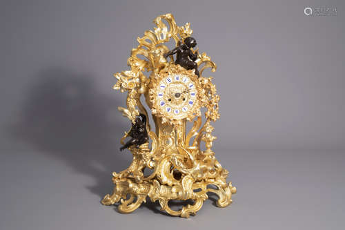 An impressive French gilt and patinated bronze Rococo revival mantel clock, 19th/20th C.