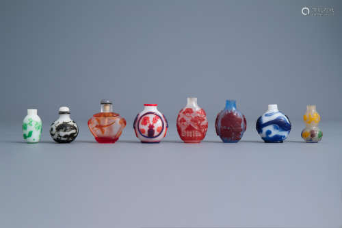 Eight Chinese overlay glass snuff bottles, 19th/20th C.
