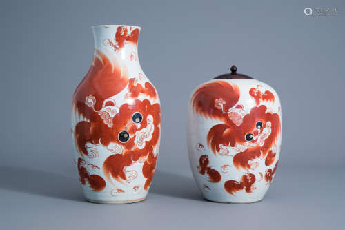 A Chinese iron red vase and a ginger jar with Buddhist lions, 19th/20th C.