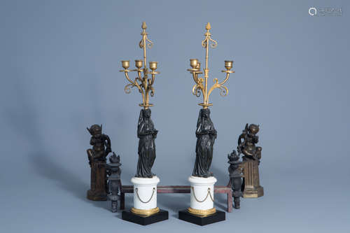 A pair of patinated bronze and marble candelabra and a pair of andirons with an angel, France, 19th/