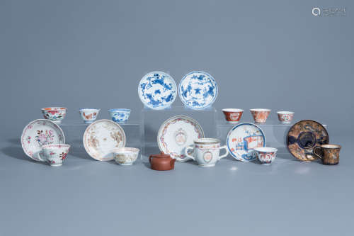A collection of Chinese and Japanese cups and saucers and a Yixing stoneware teapot and cover, Kangx