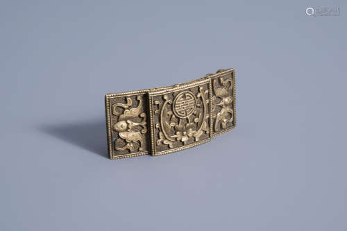 A Chinese brass belt buckle with bats and floral design, Qing or Republic