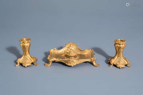 A French gilt bronze Louis XV style ink well with two matching candlesticks, 19th C.