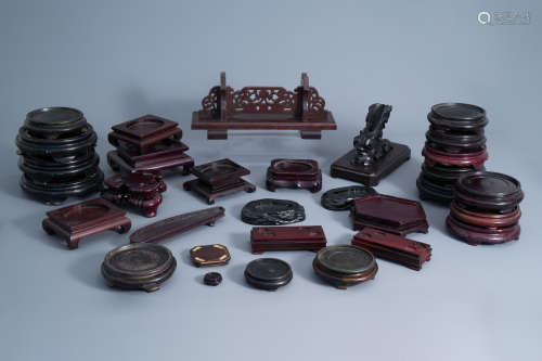 A collection of Chinese carved wooden stands, 19th/20th C.