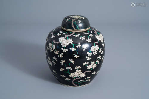 A Chinese black ground jar and cover with floral design, Chenghua mark, 19th C.