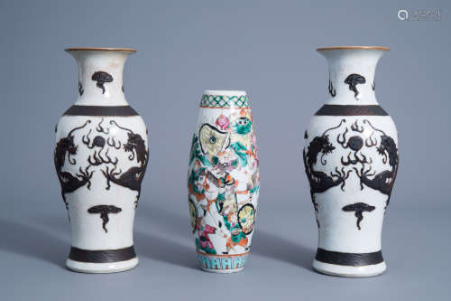 A pair of Chinese Nanking crackle glazed vases with a dragon and a famille rose vase with a warrior