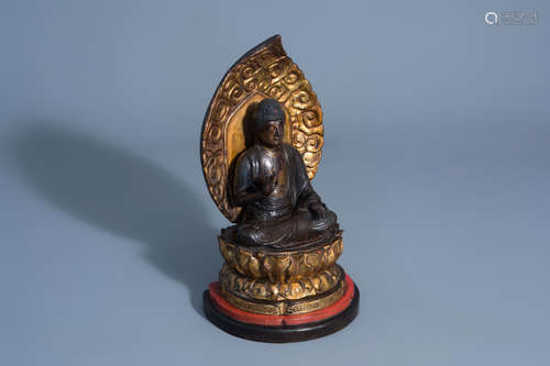 A Japanese gilt and lacquered wood figure of Buddha Amida Nyorai, Edo/Meiji, 18th/19th C.