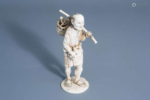 A Japanese ivory okimono of an elderly farmer, signed, Meiji, 19th C.