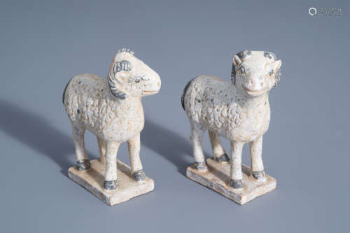 A pair of Chinese painted pottery models of rams, probably Han dynasty