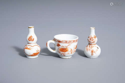 Two Chinese gilt and iron red doll's house miniature vases and a miniature cup, Kangxi/Qianlong