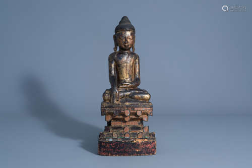 A gilt wooden figure of Buddha, Burma, 19th C.