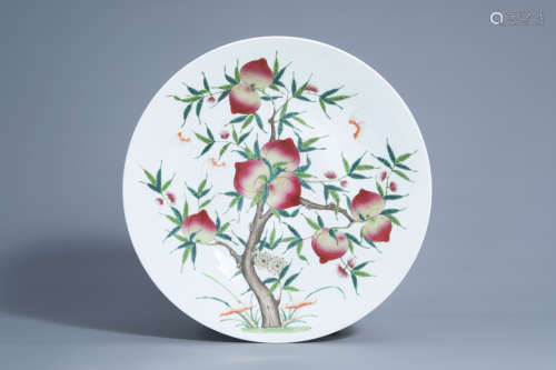 A large Chinese famille rose 'nine peaches' charger, 19th/20th C.