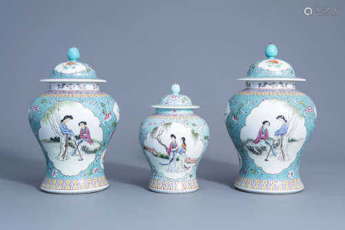 Three Chinese famille rose turquoise ground vases and covers, Qianlong mark, 20th C.