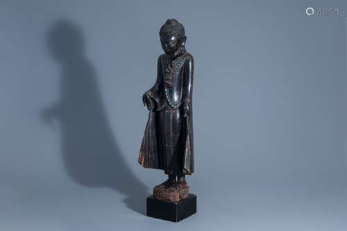 An inlaid wooden figure of Buddha, Thailand, 19th/20th C.