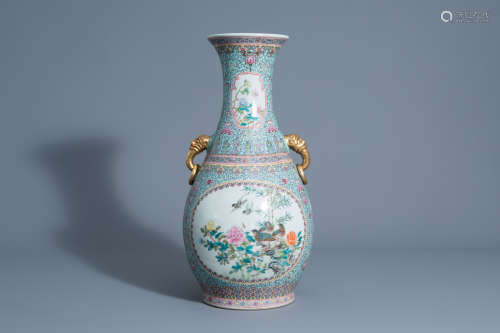 A Chinese famille rose vase with birds among blossoming branches, Qianlong mark, 20th C.