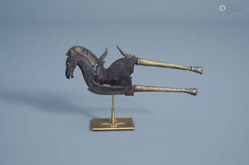 An inlaid iron and brass betel nut cutter in the shape of a horse, Indonesia, 19th C.