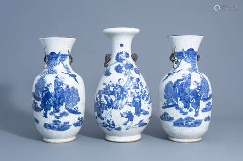 Three Chinese Nanking crackle glazed blue and white vases with figures in a landscape, 19th/20th C.