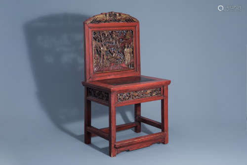 A Chinese lacquered and gilt wooden chair, 19th/20th C.