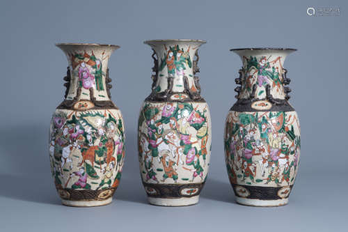 Three Chinese Nanking crackle glazed famille rose vases with warrior scenes, 19th C.