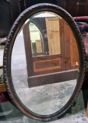One oval framed mirror (1)